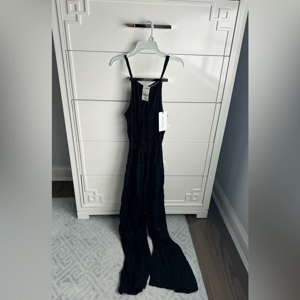 New with tags black silk jumpsuit size small. York street